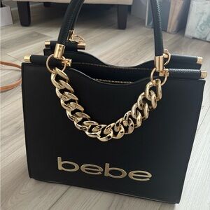 Bebe handbag black gold leather